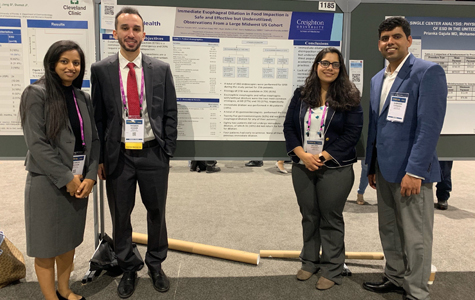 Fellows with poster