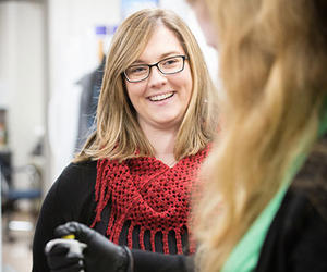 Holly Stessman with a lab assistant