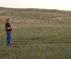 John O'Keefe flying a drone