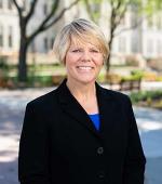 Mary Chase smiling on campus