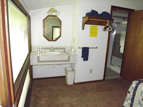 Vanity in a bedroom in Brebeuf Cabin