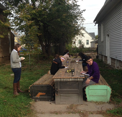 COM 442 students conducting fieldwork