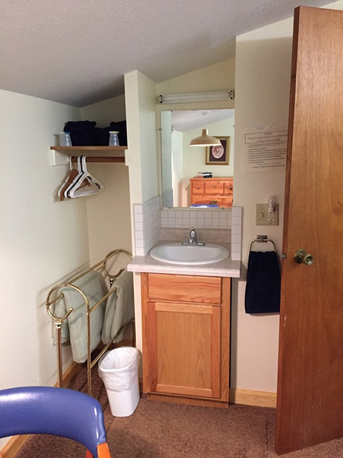 Vanity in a bedroom in Goupil cabin