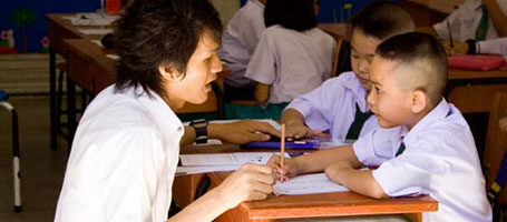 Student teacher with elementary students