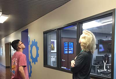 Radlab Interns looking at Alexa in ceiling