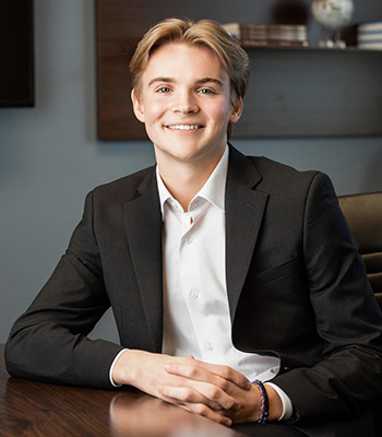 Ryan Berg in boardroom setting.