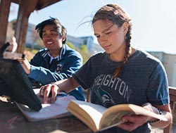 Creighton students studying outside
