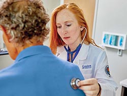 Doctor checking health of patient