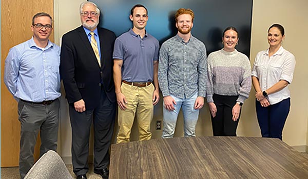 Group Photo of 2023 - 2024 Baumann Scholars and professors.
