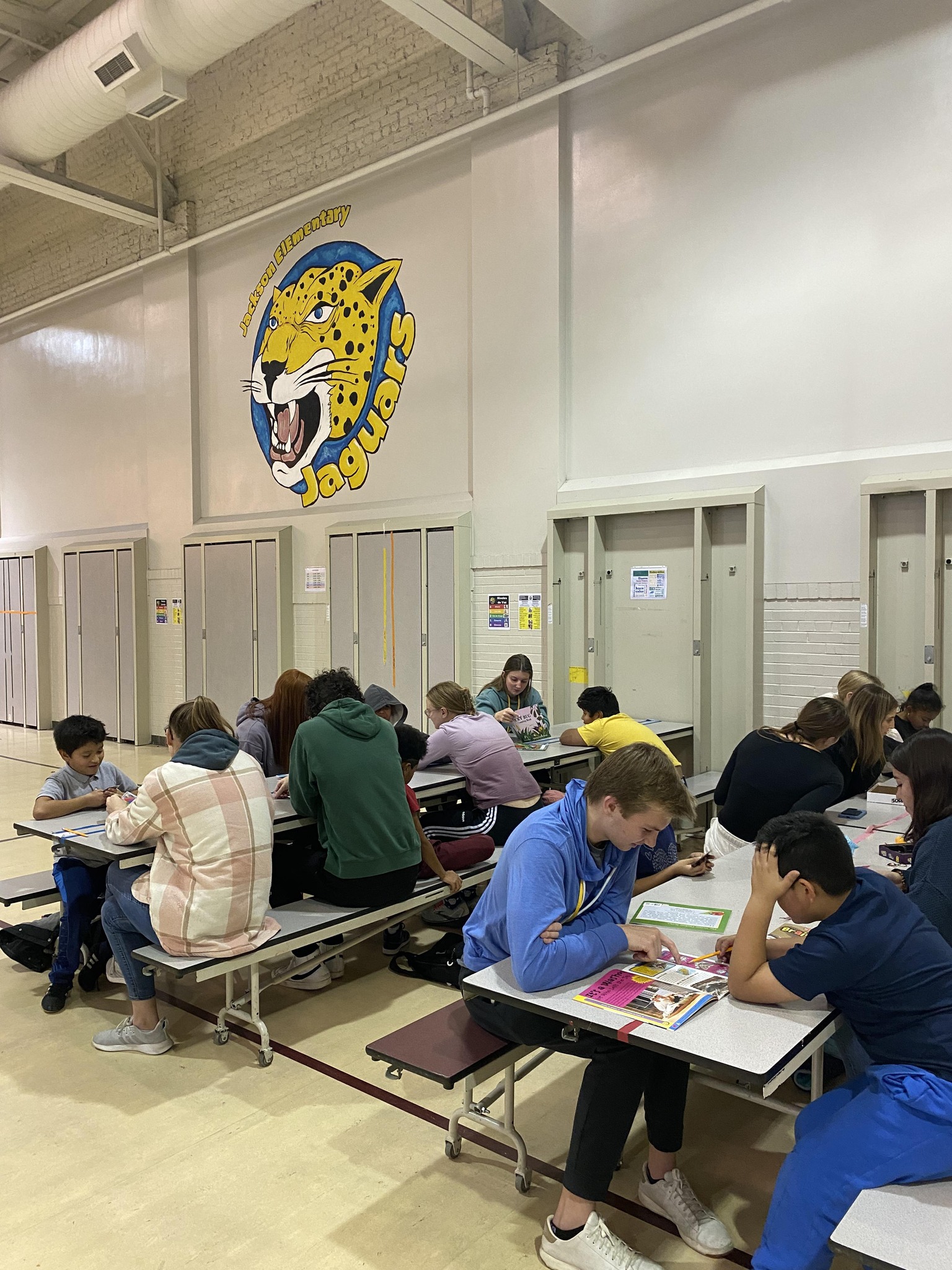 reading in school cafeteria 