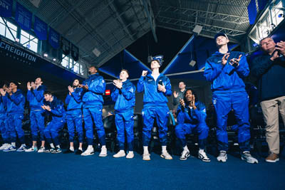 Creighton basketball team listening to selection show.