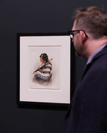 Appleford admiring native art work.