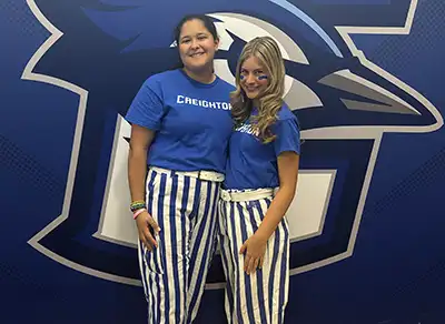 Rian Jacobs with friend wearing Bluejay gear.