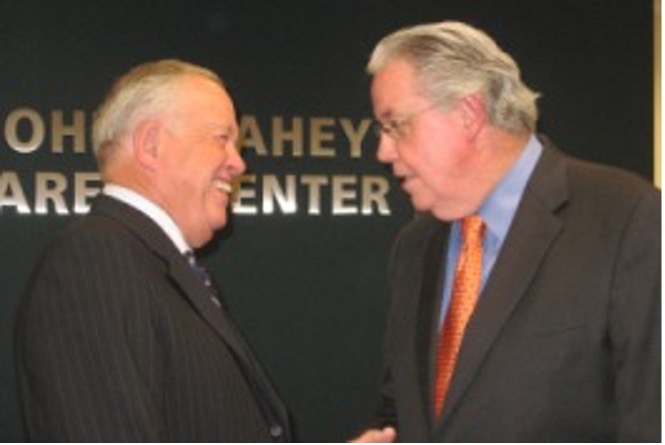 John P. Fahey and his brotherMichael G. Fahey shaking hands at the dedication ceremony of the John P. Fahey Career Center