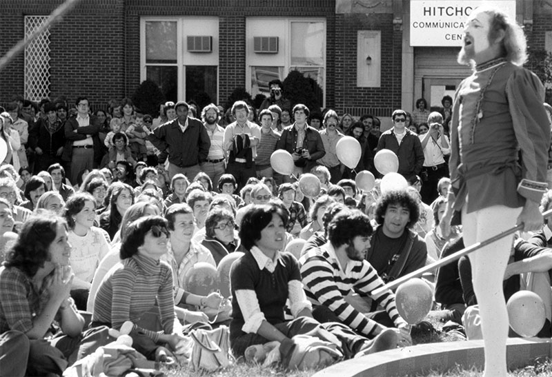 People gathered outside in conversation
