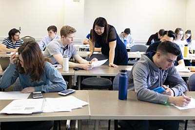 Accounting students receiving instruction at Heider.