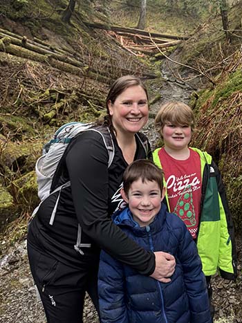 Kathleen Hansen with her two sons in Alaska.