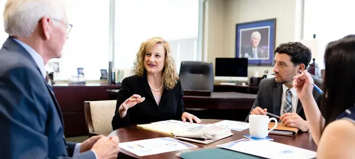 Leaders meeting around a table