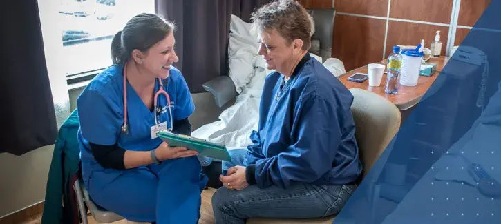 Nurse and patient discussing a plan