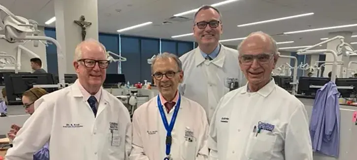 Gerald Brundo and dental faculty