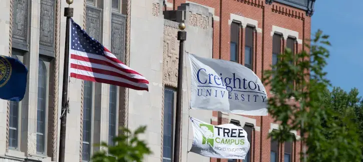 Tree Campus Higher Education flag flies over Creighton University