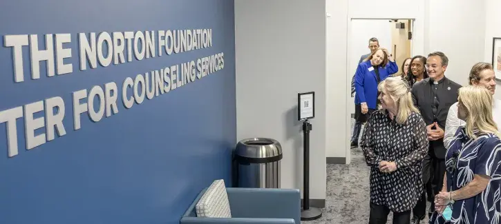 People touring through new facility at dedication.