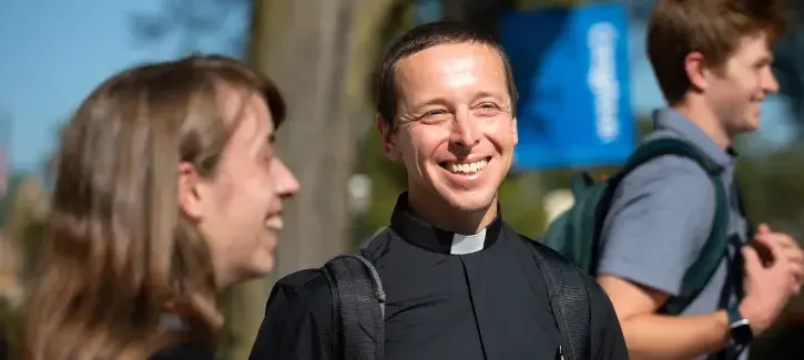 Rev. Christopher Krall attending outside event at Creighton.