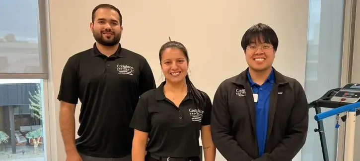 Jamie Nesbit with staff members