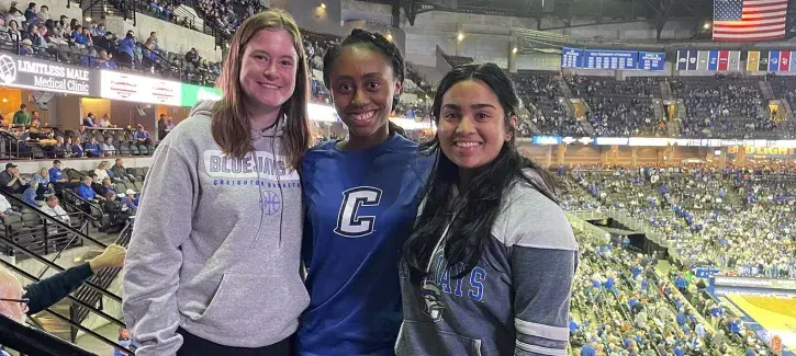 Lauren Burris with friends at Creighton basketball game.