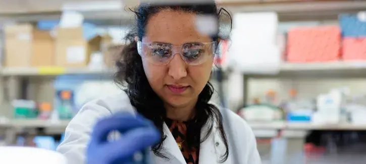Woman at Creighton in research lab.