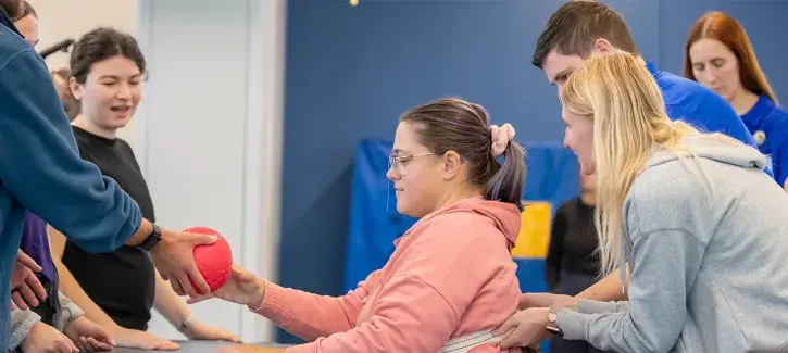 SPAHP student doing therapy with patient