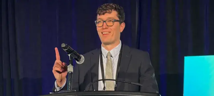 Connor Yost speaking at AMA conference in Chicago