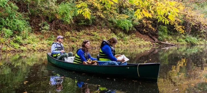 Research team examining water passage.