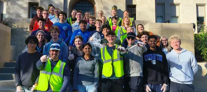 Sustainability students pose for photo on campus.