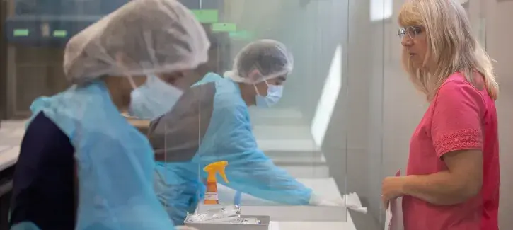 Lab workers in action