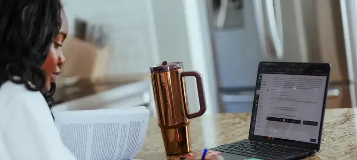 Student studying during online class.