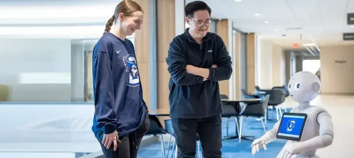 Pepper the Robot with students at Creighton.