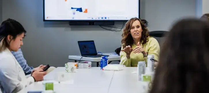 Emily Knezevich talks with students