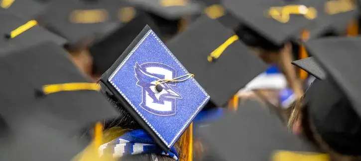 Decorated Bluejay cap at commencement