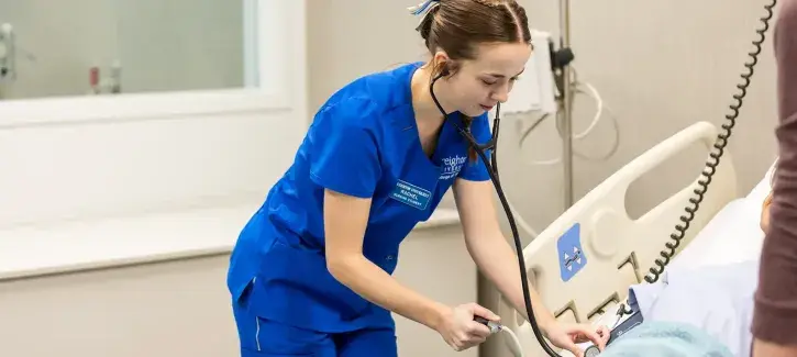 Rachel Malander at work in hospital room.
