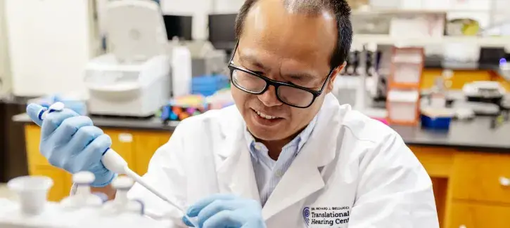 Tao Nih in action in the lab.