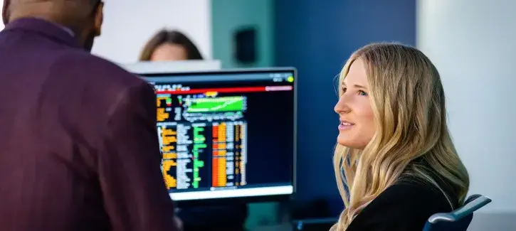 Finance professionals analyzing data.