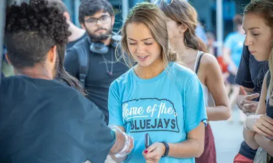 Students meeting each other at student orientation session.