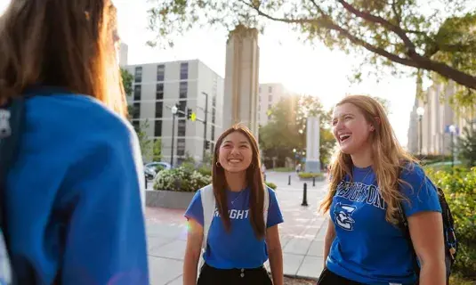 students on the mall wearing Creighton shirts