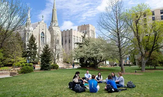 Students sitting in a circle talking