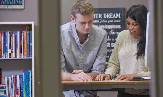 Success Coach meeting with student