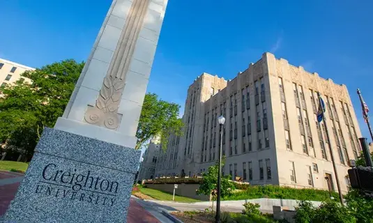 Creighton campus mall view on sunny day.