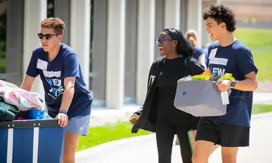 Students moving into their residence hall.