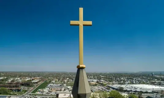 Cross atop St. John's church.