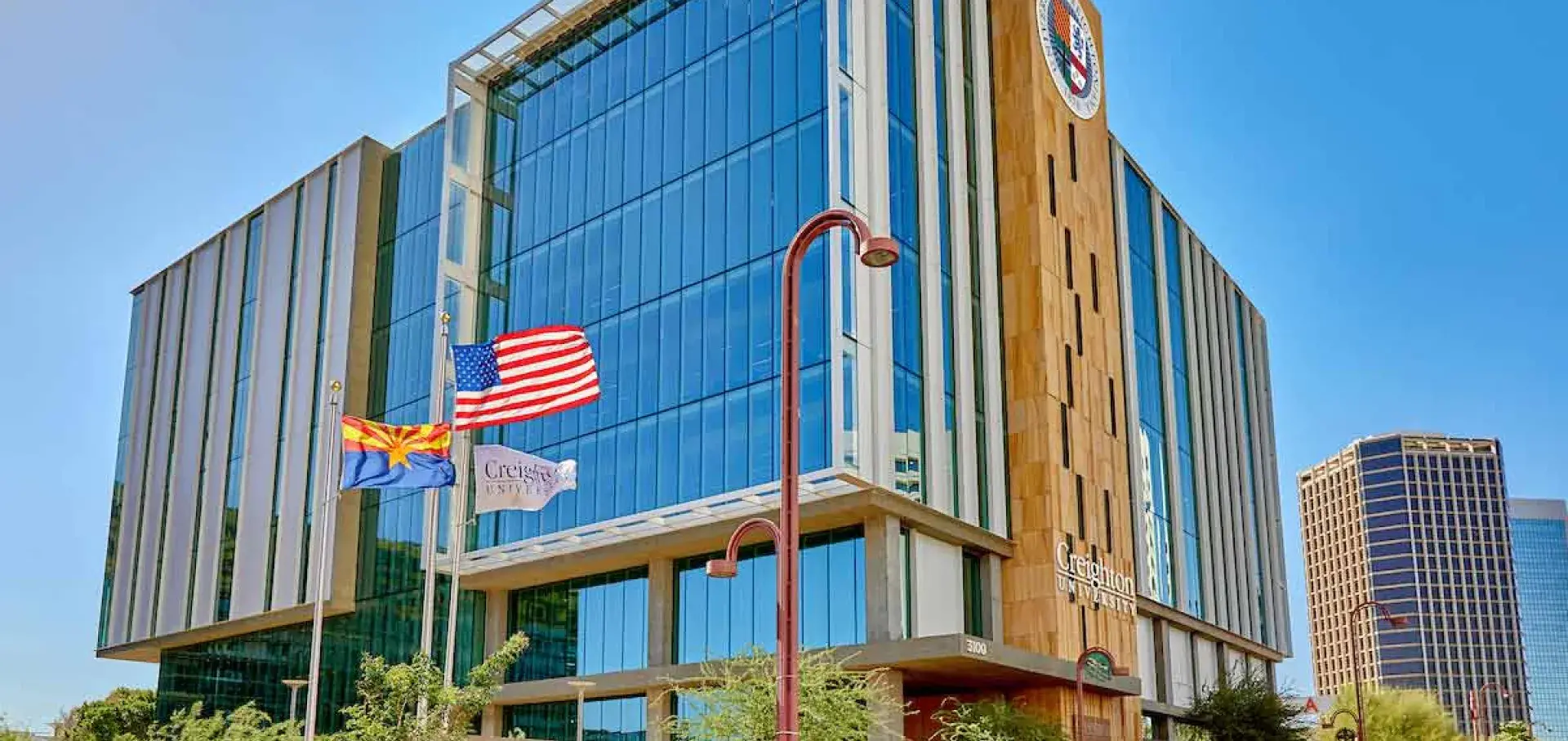 Creighton Phoenix Campus facility on sunny day.